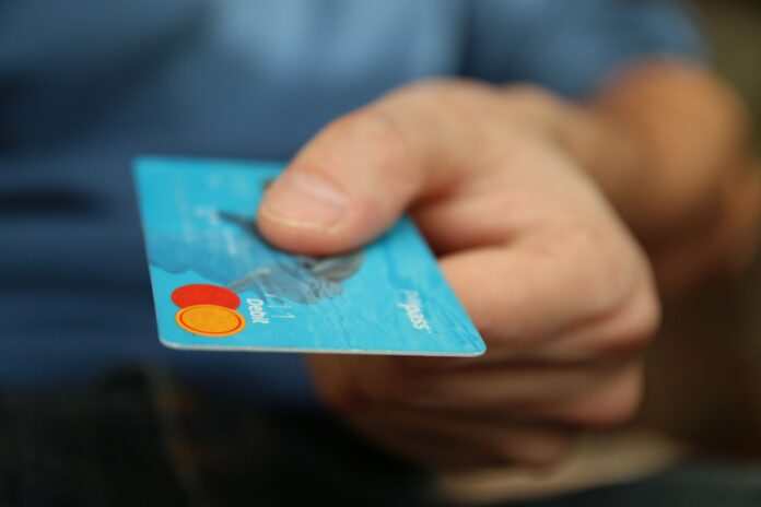 Digital payment and credit card representing UPI and cross-border payments